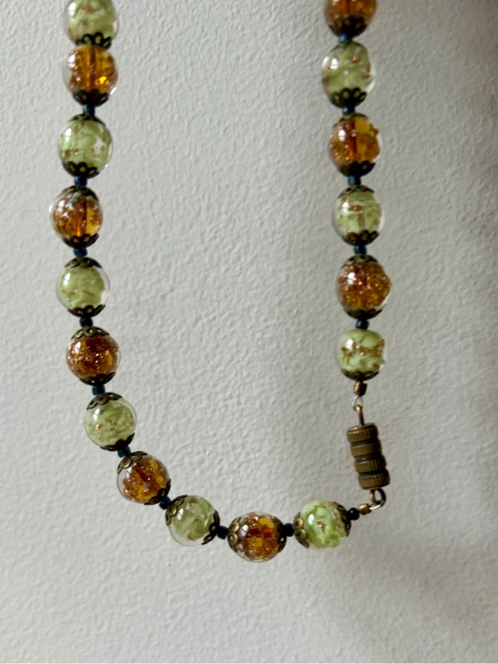 1940s necklace of amber and green Italian art glass beads